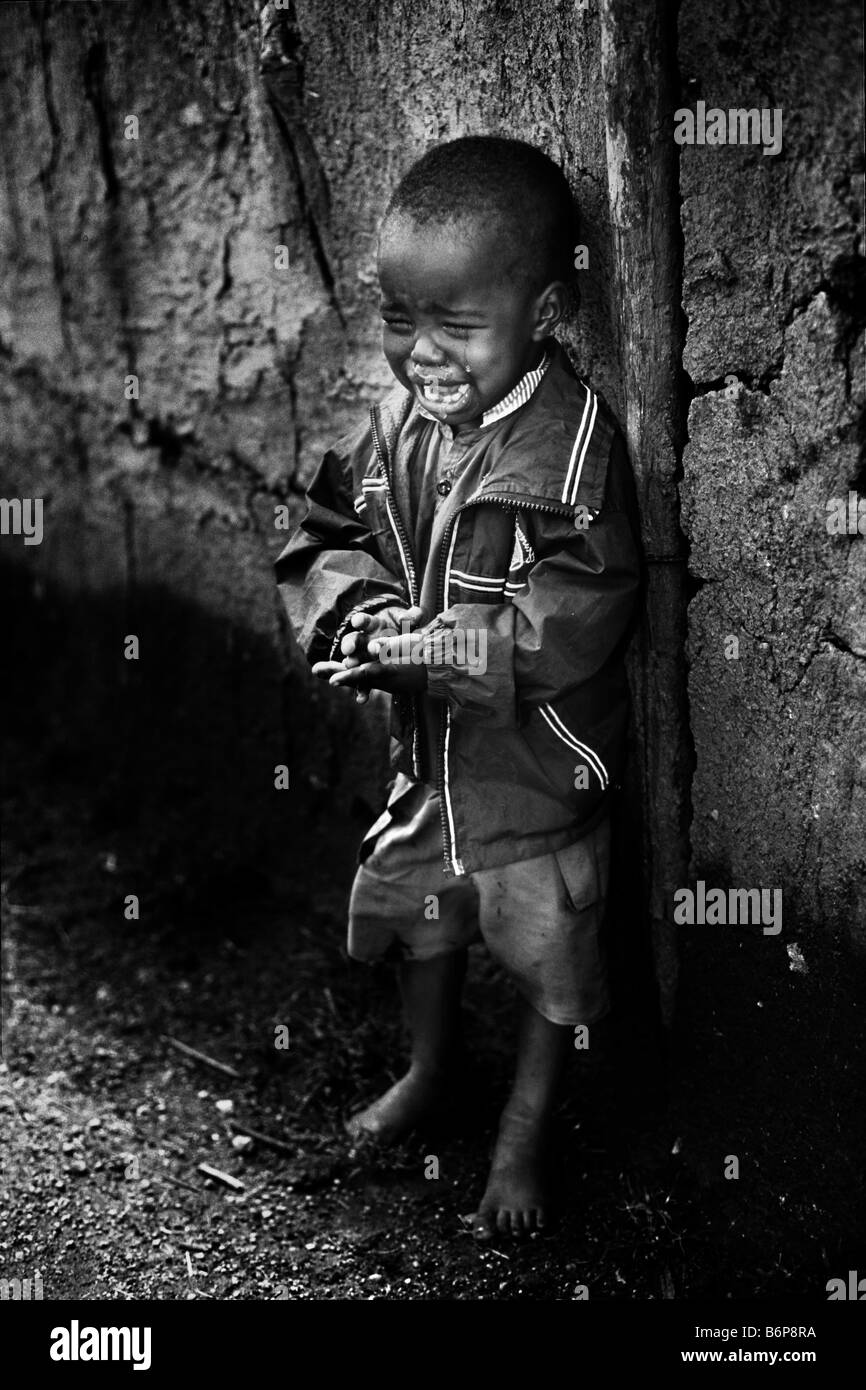 Masai Mara Kenya portrait of a crying boy Stock Photo