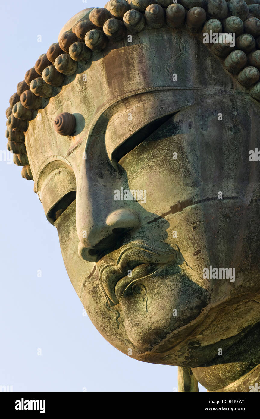 Closeup of the bronze giant Buddha statue called a Daibutsu at Kotoku