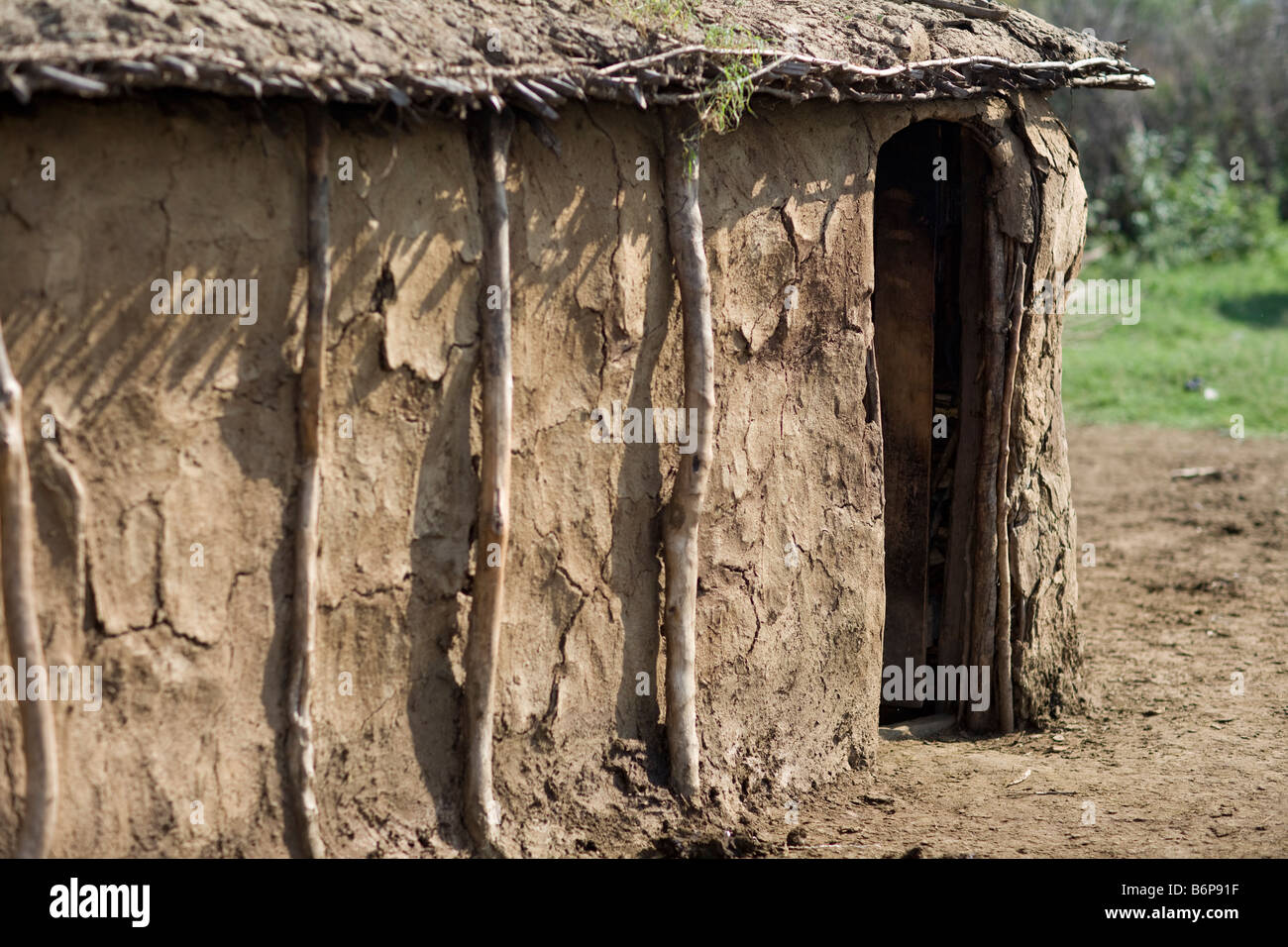 mud hut in masai mara village Stock Photo