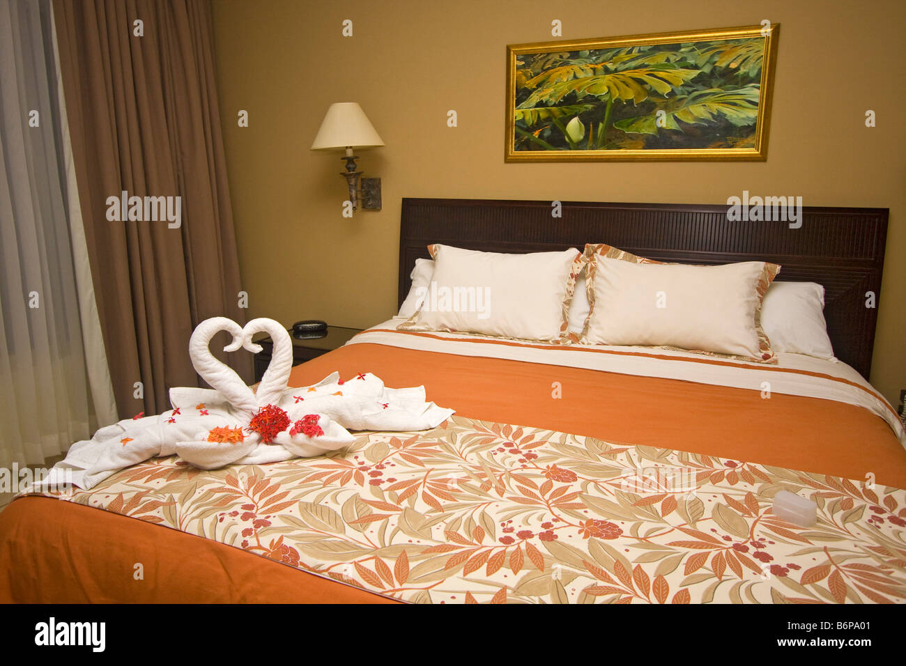 Bedroom Of Hotel Room With Swans Made Of Towels At Flamingo