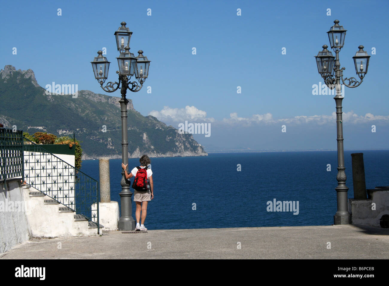 Woman walker admiring the sea view at Atrani on the Amalfi Coast Italy Stock Photo