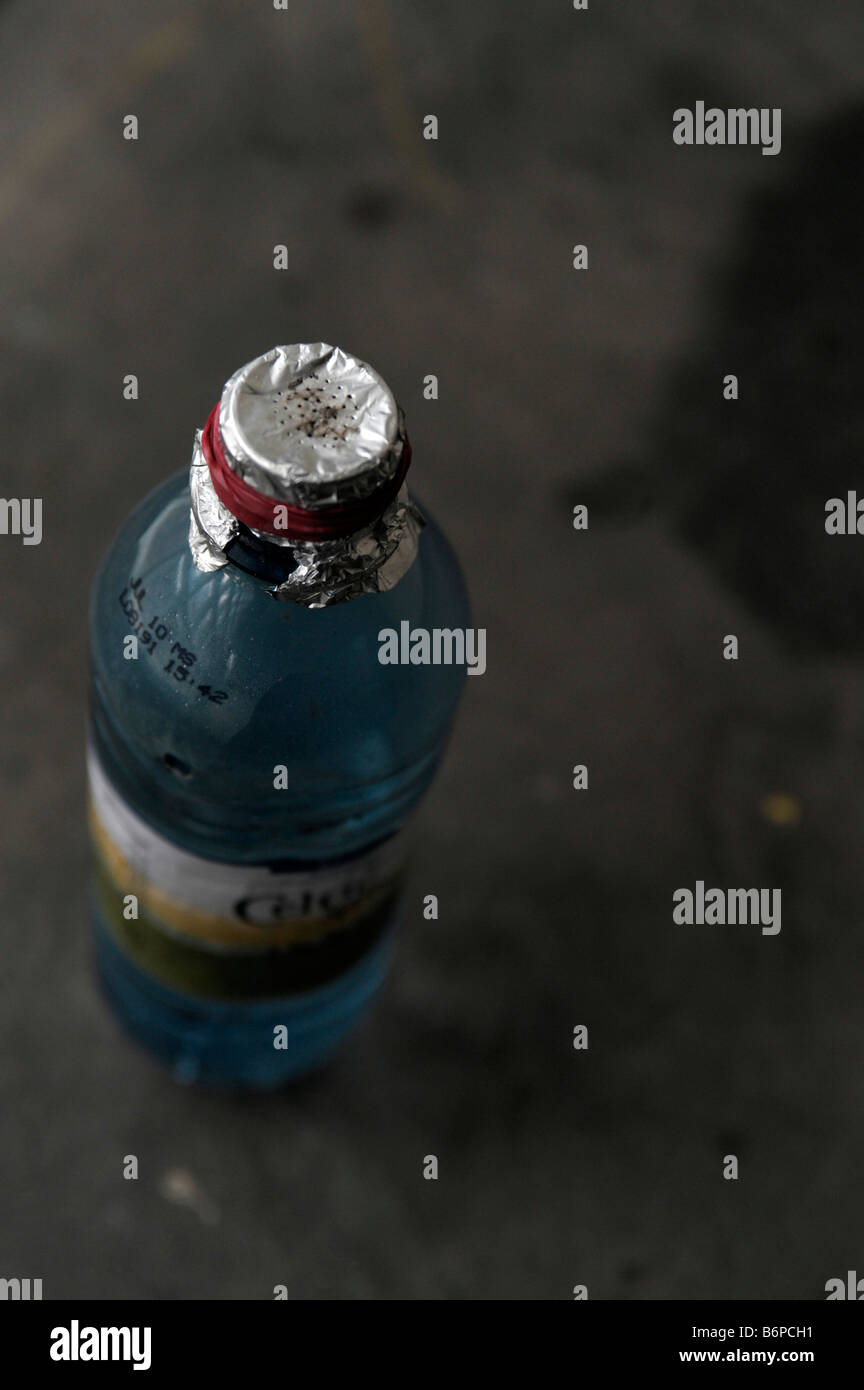 A mineral water bottle especially adapted for the inhalation of crack