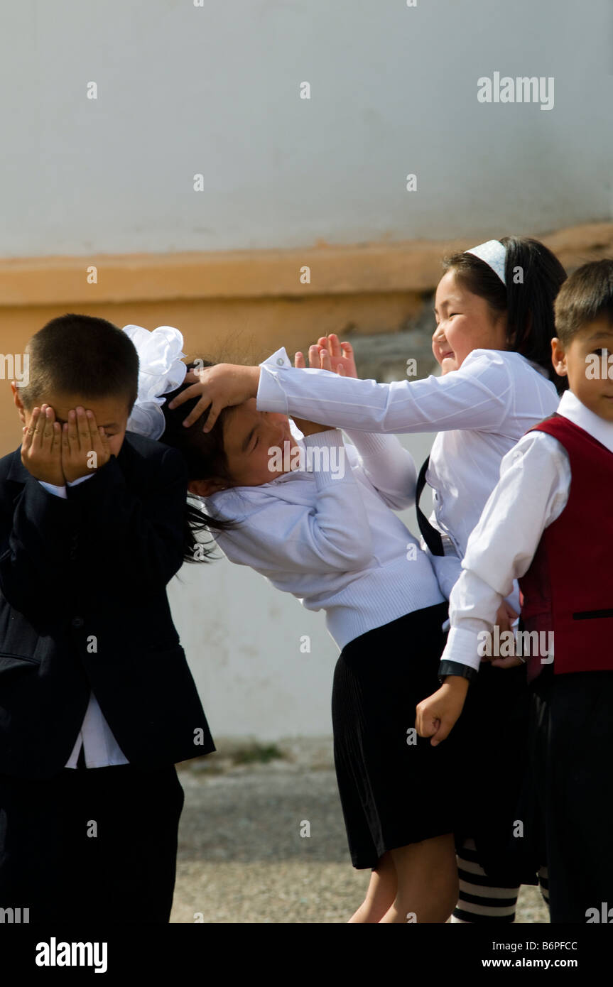 Mongolian school children playing at shcool Stock Photo
