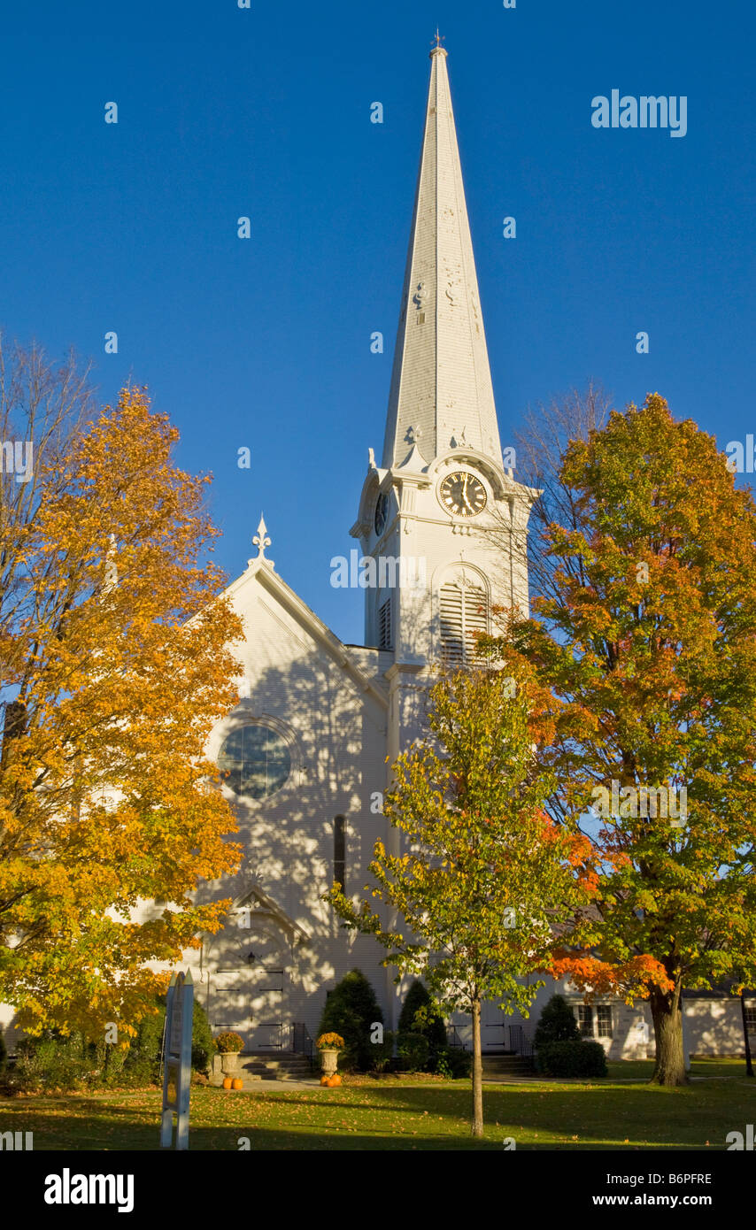 Autumn fall colours around traditional white timber clad church Manchester Vermont USA United States of America Stock Photo
