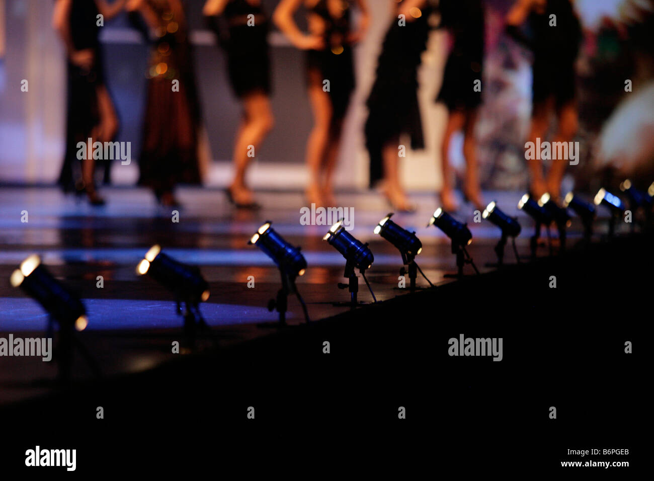 Footlights at the side of a fashion catwalk in the UK Stock Photo