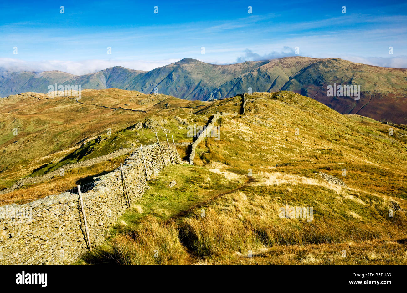 The view across the fells on a sunny autumn day from Wansfell Pike in the Lake District Cumbria England UK Stock Photo