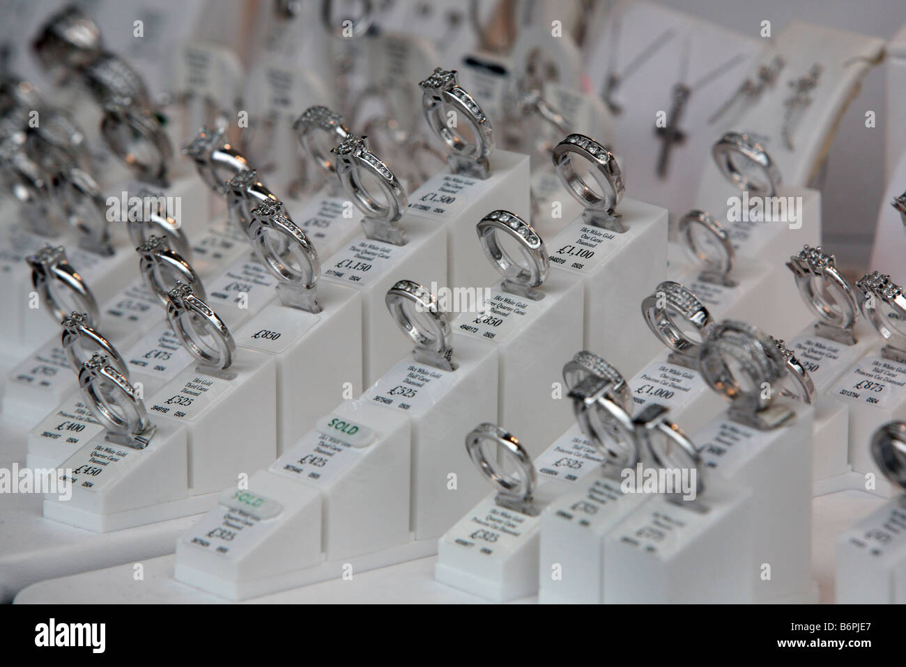 Diamond ring window display in an Ernest Jones store in Moorgate London Stock Photo