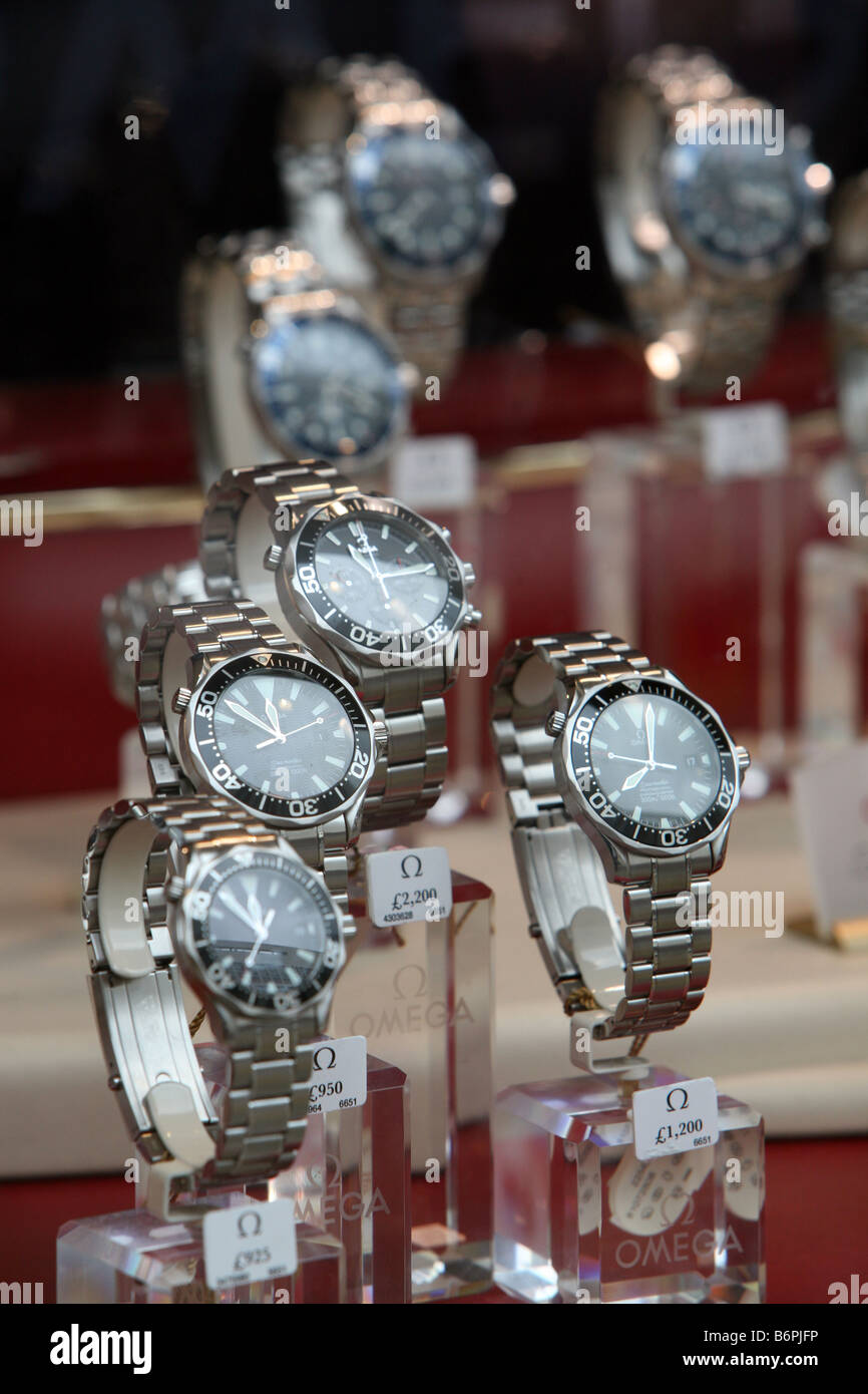 Omega watches on display in the window of an Ernest Jones store in Moorgate London Stock Photo