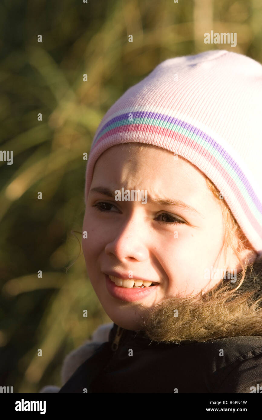 ten year old girl in hat on winter s day Stock Photo Alamy