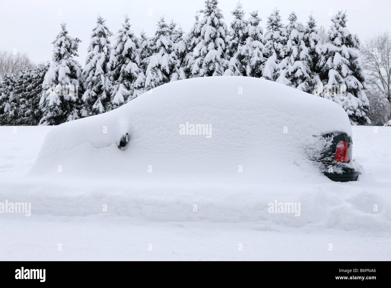 Car completely buried from snow storm Stock Photo