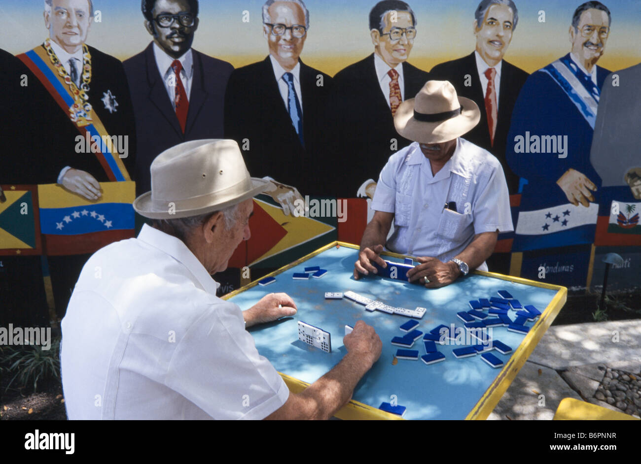 Latin men playing dominos at Domino Park, Little Havana, Miami, Florida Stock Photo