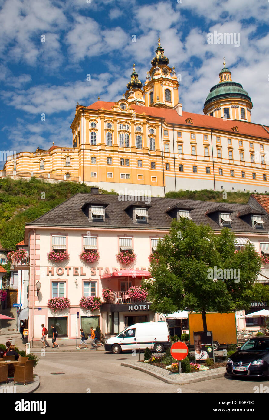 Melk Abbey looming over Hotel Stadt Melk in town below in scenic Wachau Valley along Danube River Stock Photo