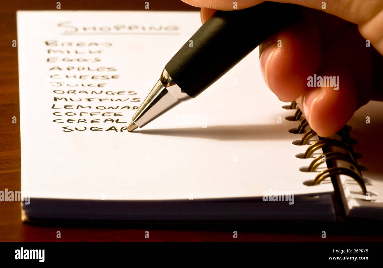 Writing a shopping list Stock Photo