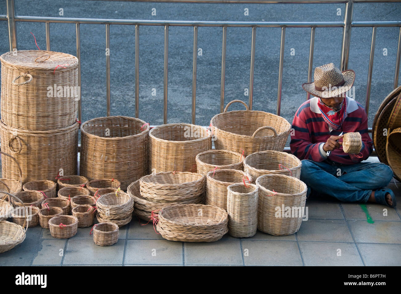 basket maker and his wares in Bangkok Thailand Stock Photo Alamy