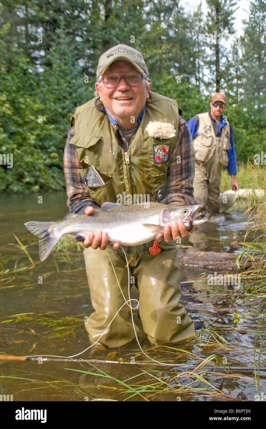 Doug Wilson with a fly caught Pink salmon that was released after the