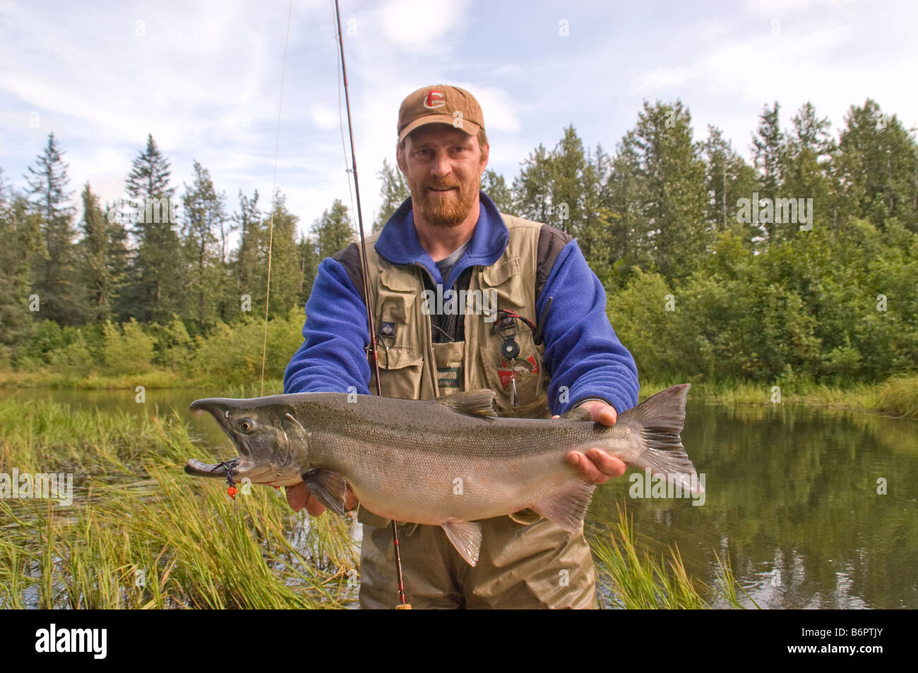 Angler with a Silver salmon caught on the Robe River near Valdez