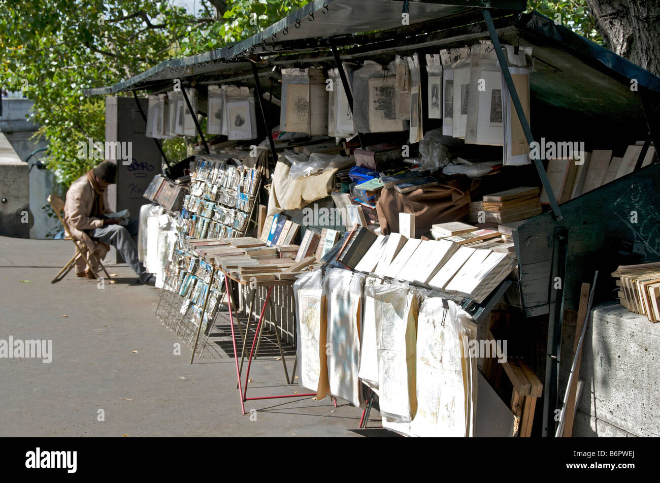 Paris. Bouquiniste book seller at quai des Grands Augustins on Seine bank . France Stock Photo