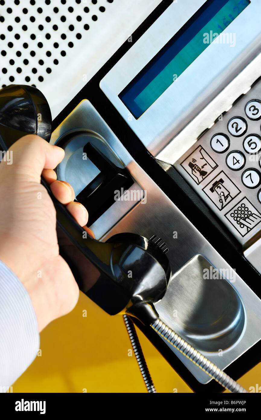 Using a public telephone Stock Photo Alamy