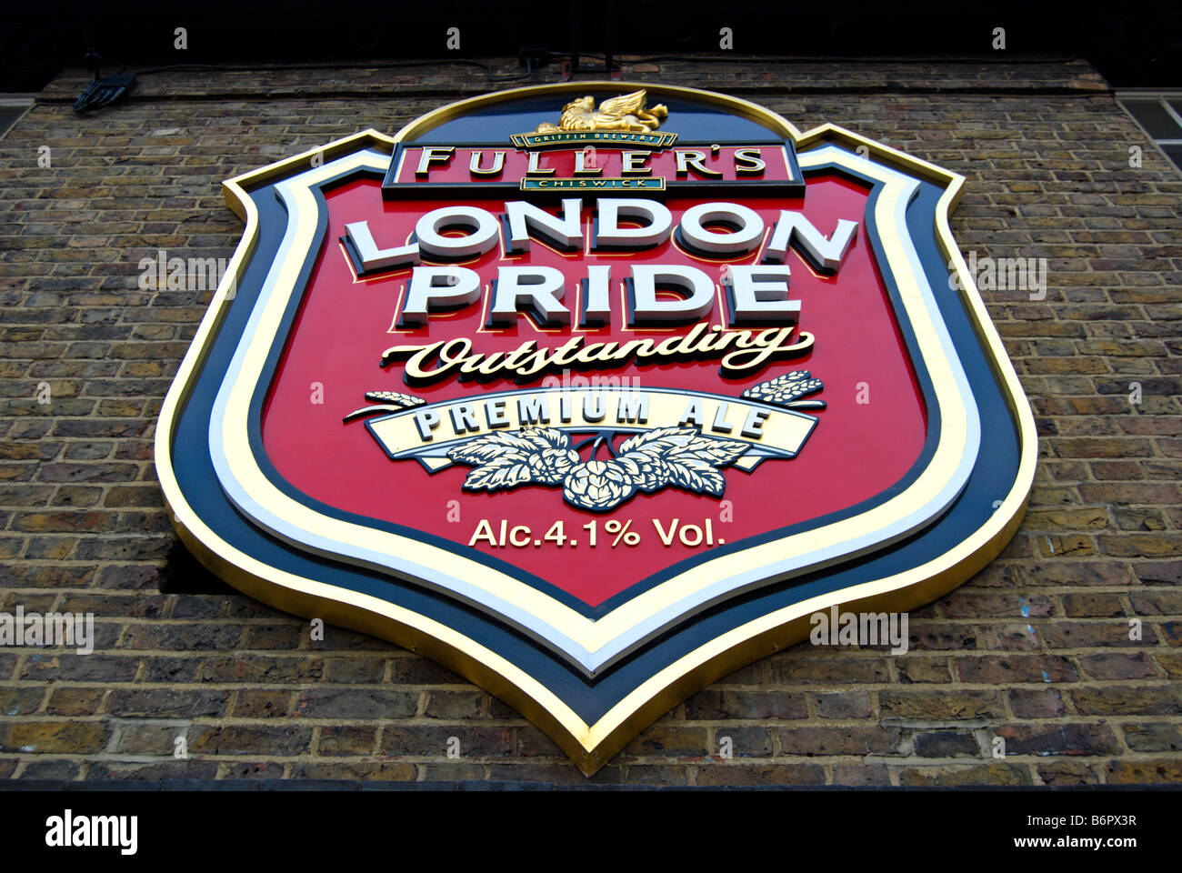 london pride logo on the wall of fuller's griffin brewery, chiswick, west london, england Stock Photo