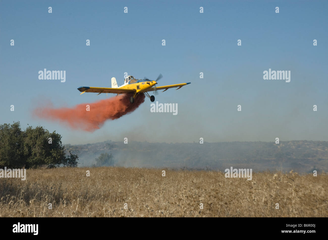 Israel Haifa Carmel Mountain Forest Aircraft dropping fire retardant on a wildfire Stock Photo