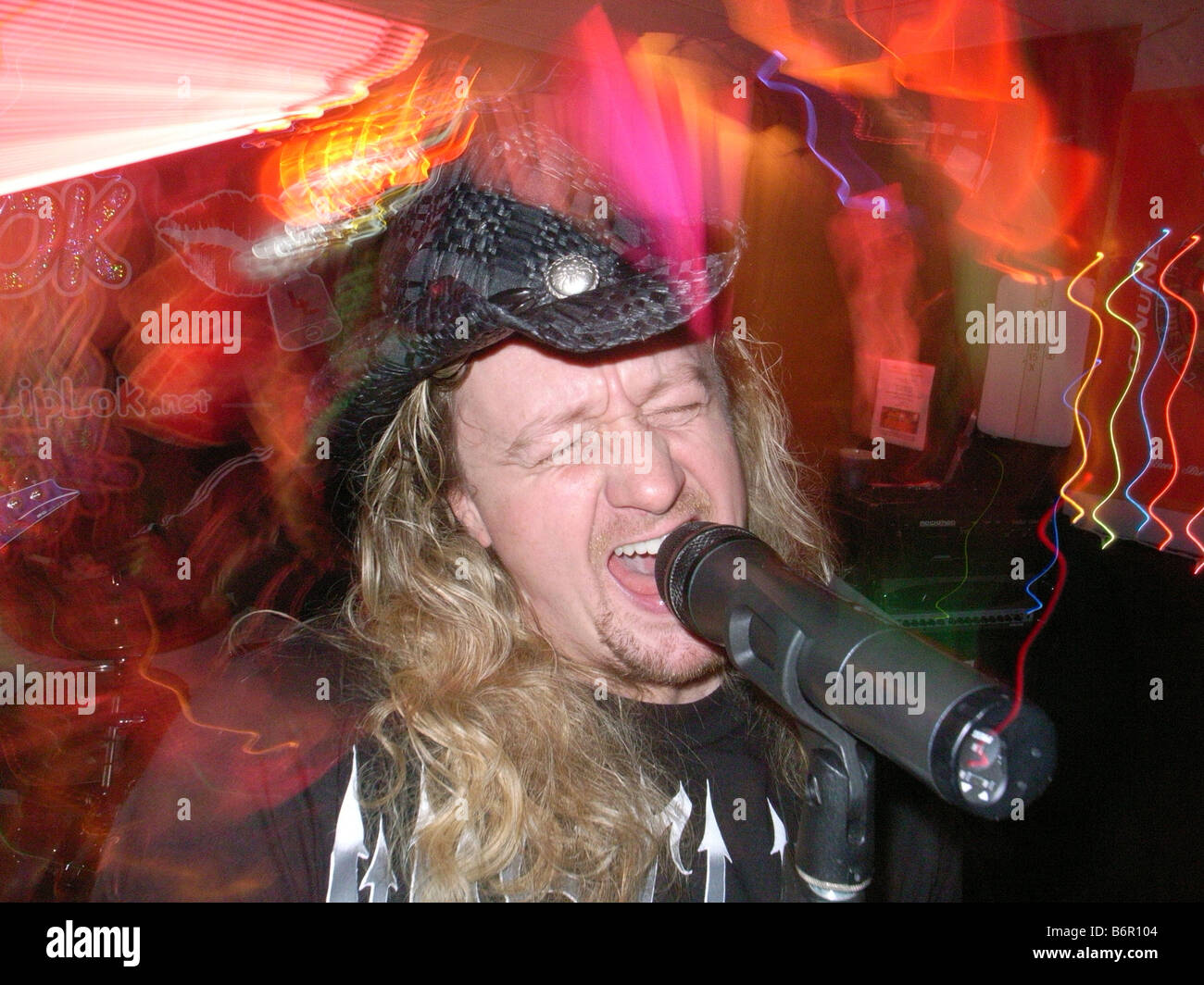 Kevin Lawless of the locally famous Bar band "Liplock" sings during a