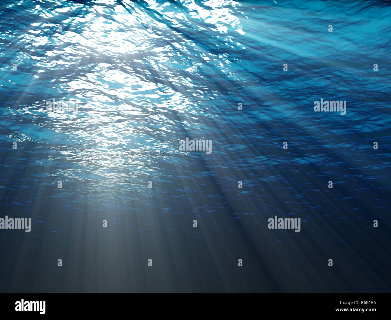 An underwater scene with sun rays shining through the water Stock Photo