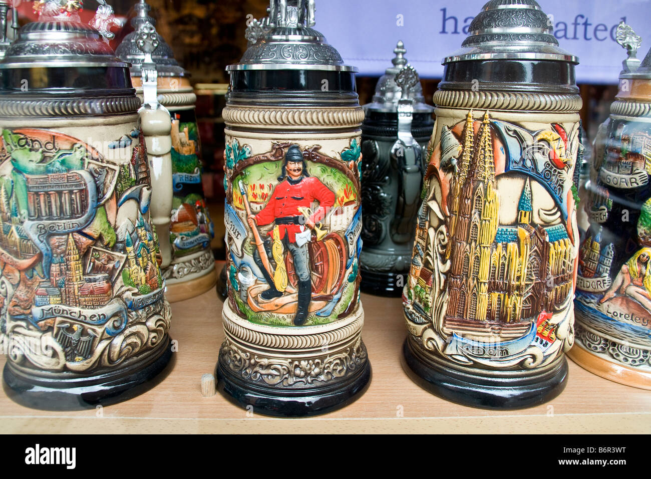 Cologne shop window display of decorative German porcelain beer steins Stock Photo