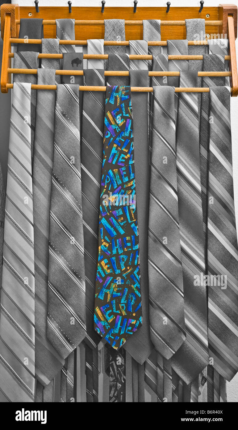 One colorful neck tie on true color tie rack with black and white neck