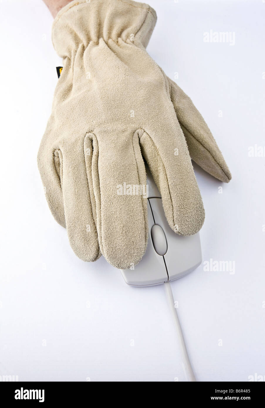 Older woman's hand in glove using computer mouse pointing device Stock Photo Alamy