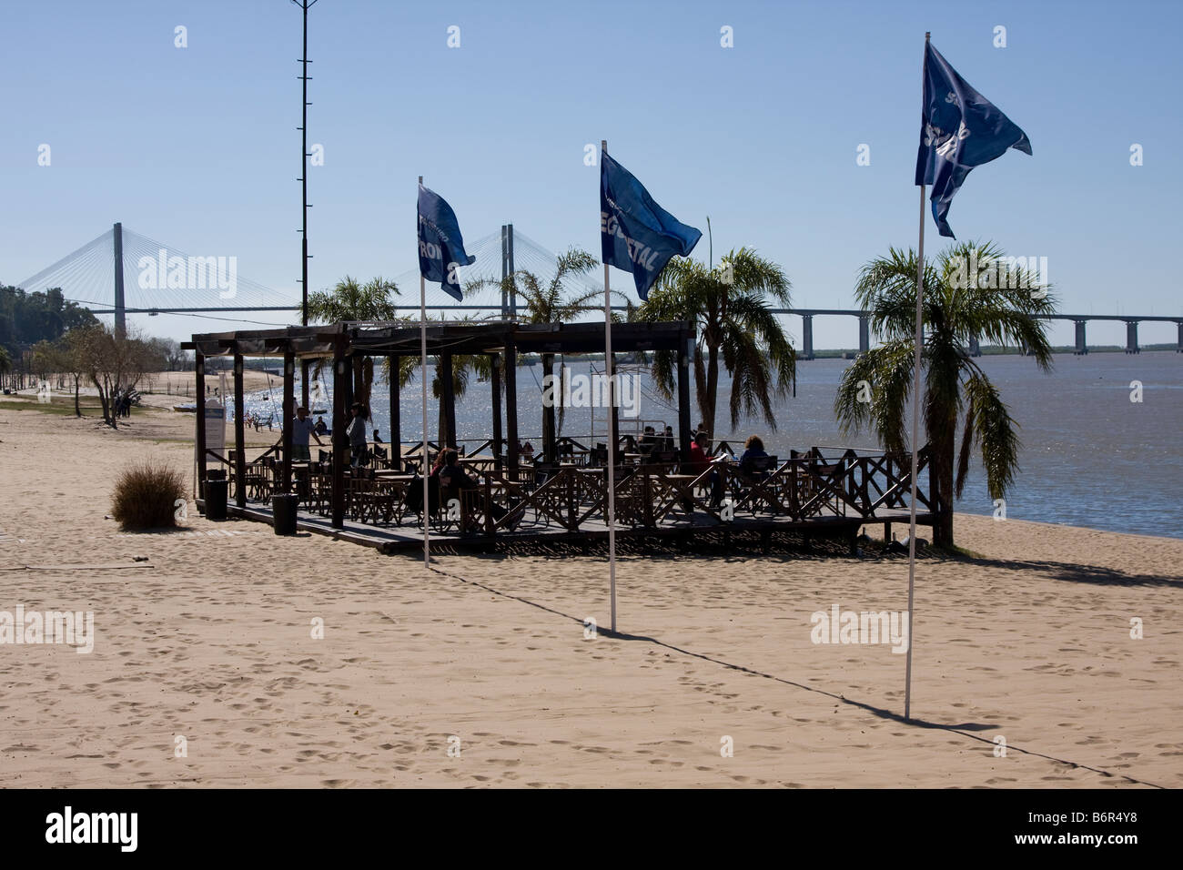 People in an outdoor bar in Parana river beach. Rosario, Argentina Stock Photo