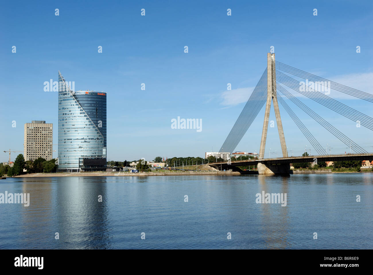 Modern tower block and Vanu Bridge Daugava River Riga Latvia Stock Photo