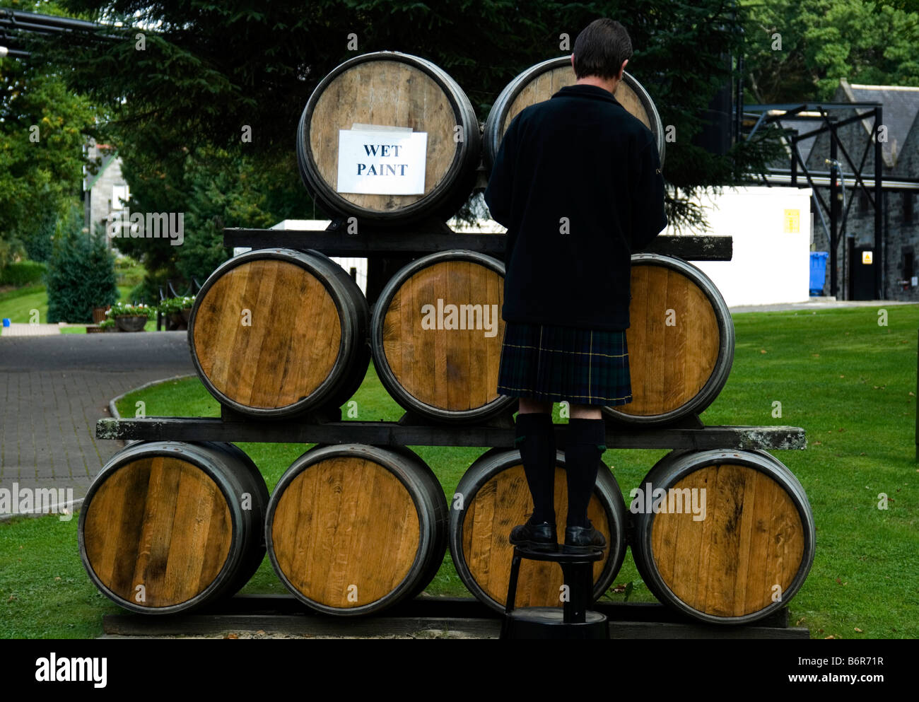 Repainting whisky vats,  Aberfeldy Distillery, Scotland Stock Photo