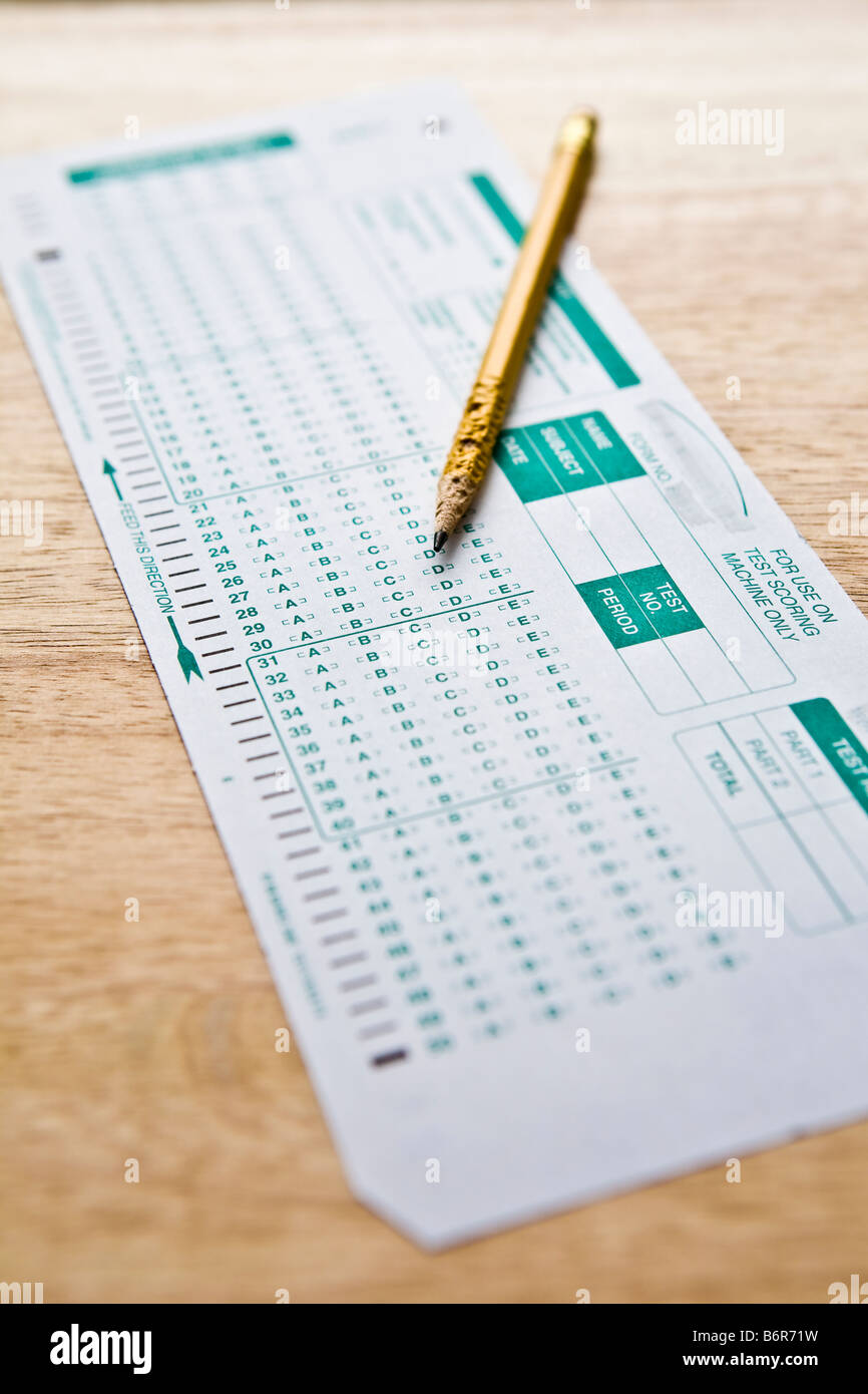 Blank machine scoring form with chewed up pencil Stock Photo