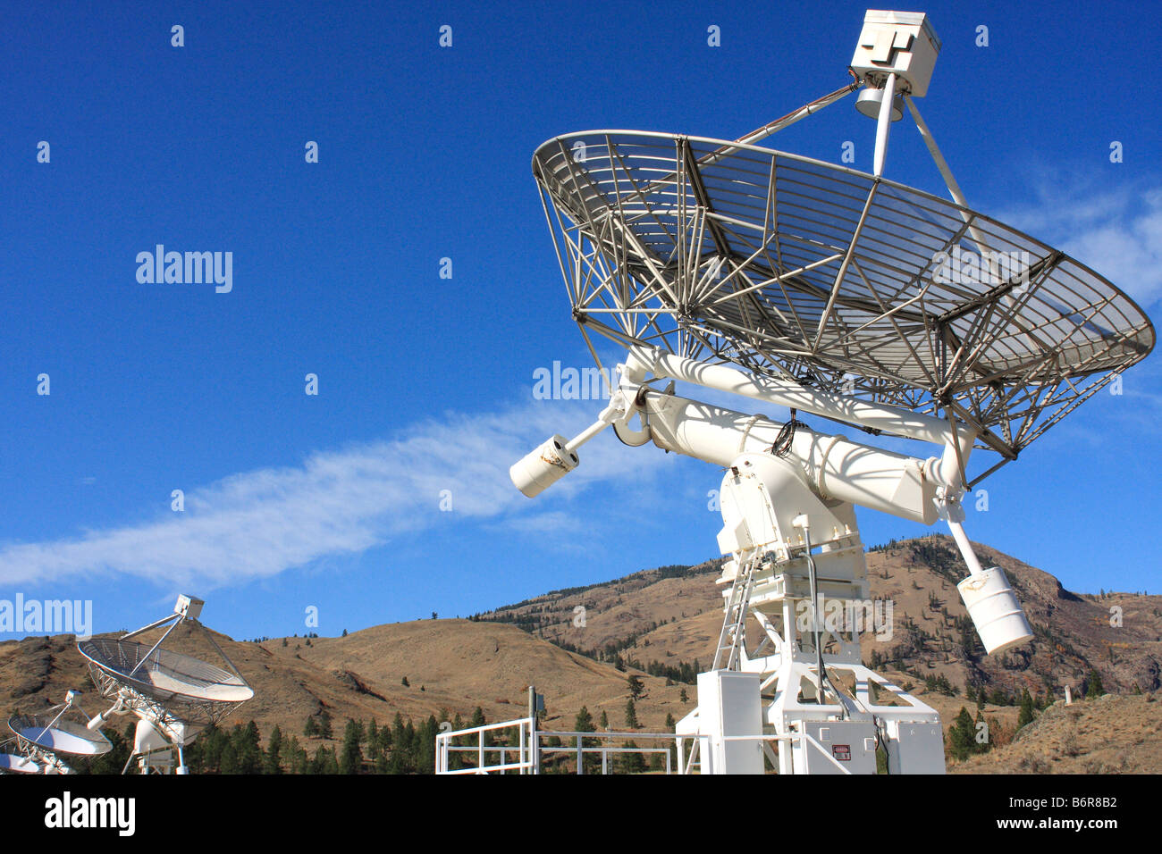 Several linked astronomical radio telescopes at the NRC facility at White  Lake near Oliver B C Canada Stock Photo - Alamy