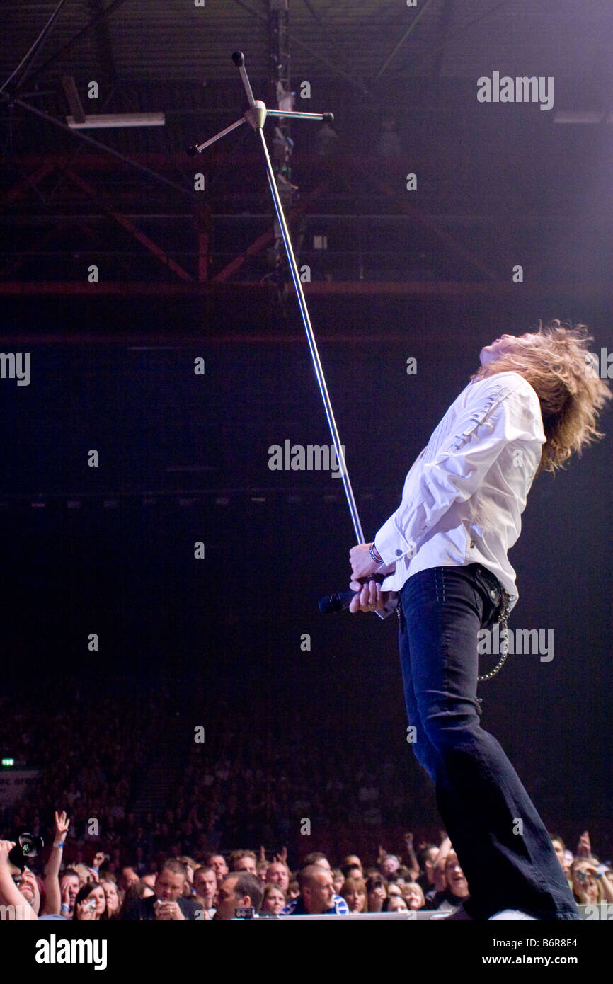 Whitesnake singer David Coverdale performing live on stage 2008 UK tour at Birmingham NEC Arena Stock Photo