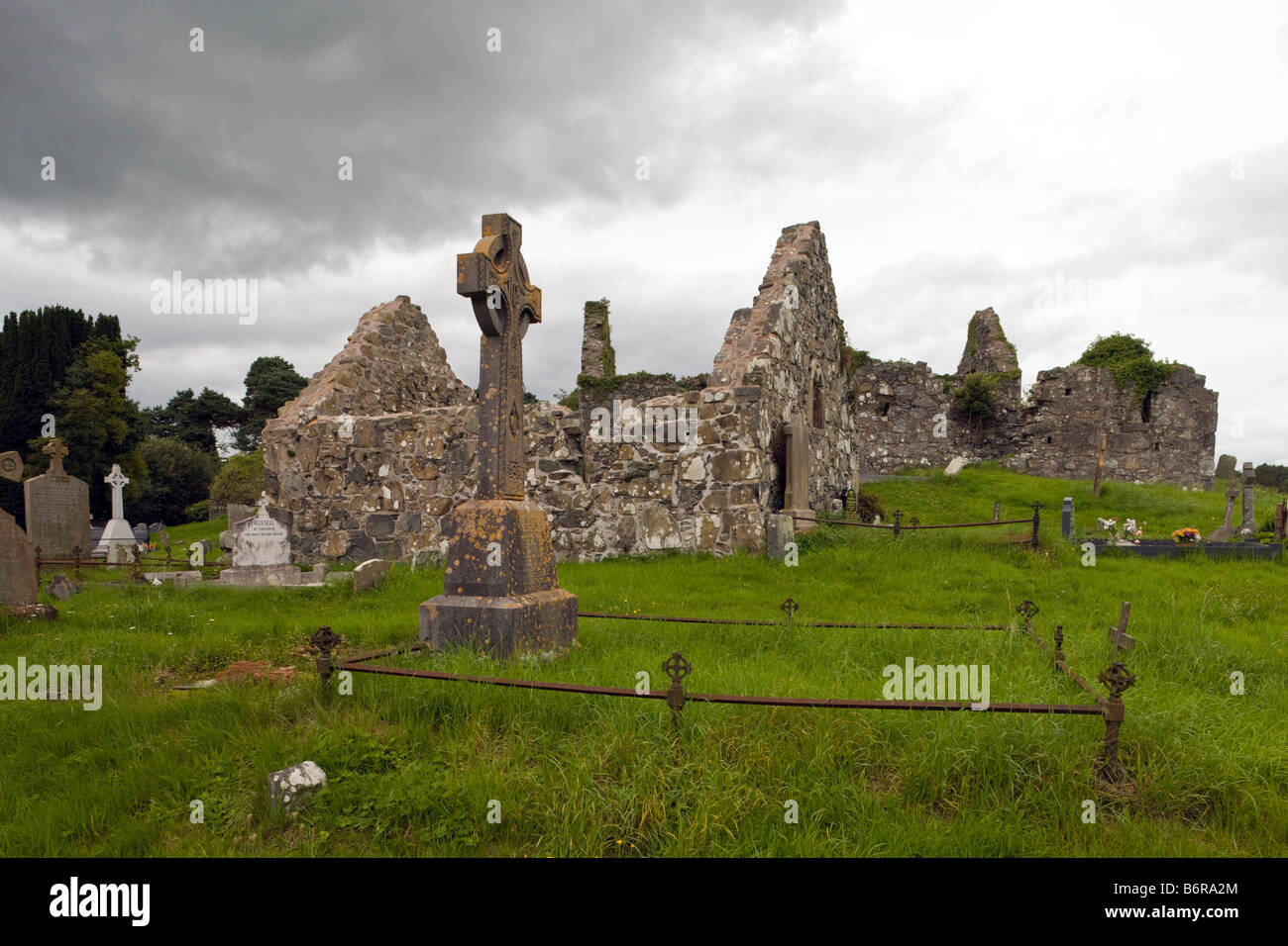 tombstone with cross in front of north parish church, Loughinisland, Co