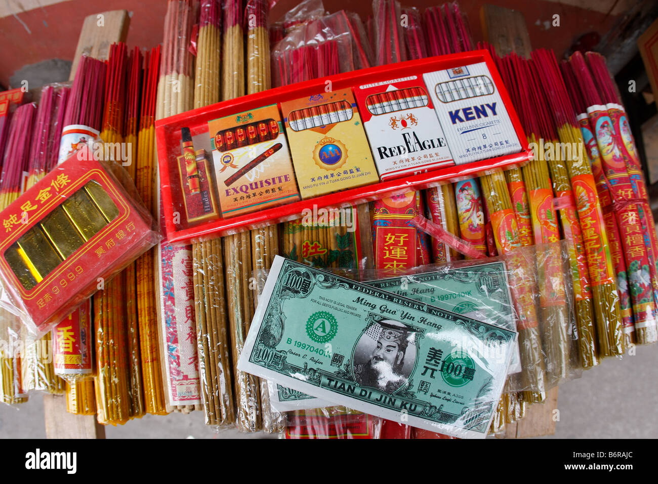 Chinese religious Joss Paper and Incense Joss paper simplified Chinese traditional Chinese pinyin jinzhi literally gold paper or Stock Photo