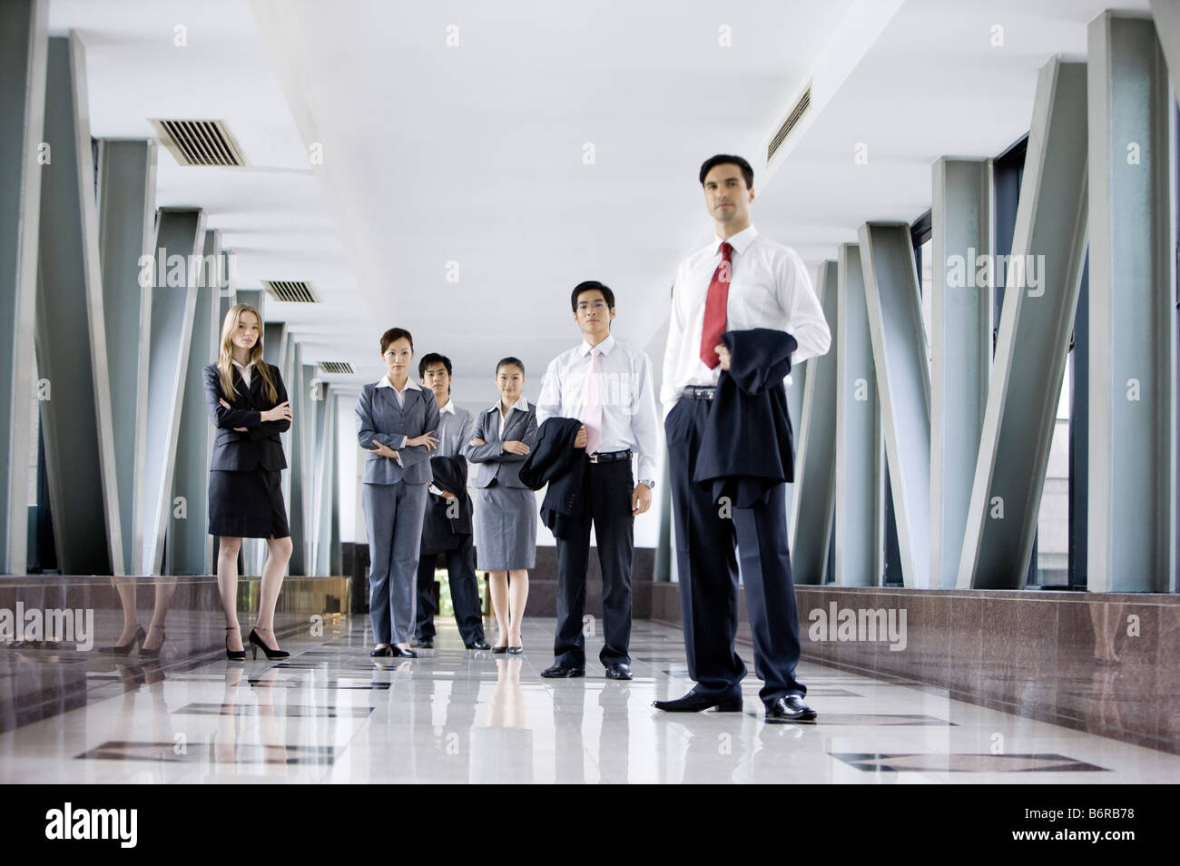 Business people standing in the office building Stock Photo