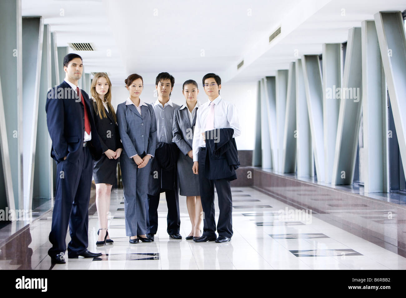 Business people standing in the office building Stock Photo
