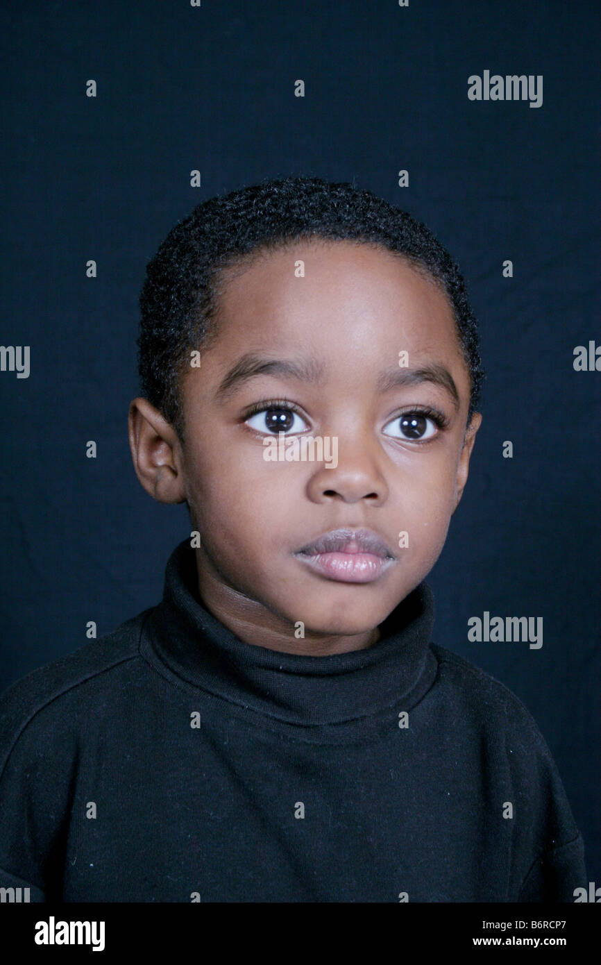 Download Thoughtful And Cute African American Boy Stock Photo Alamy