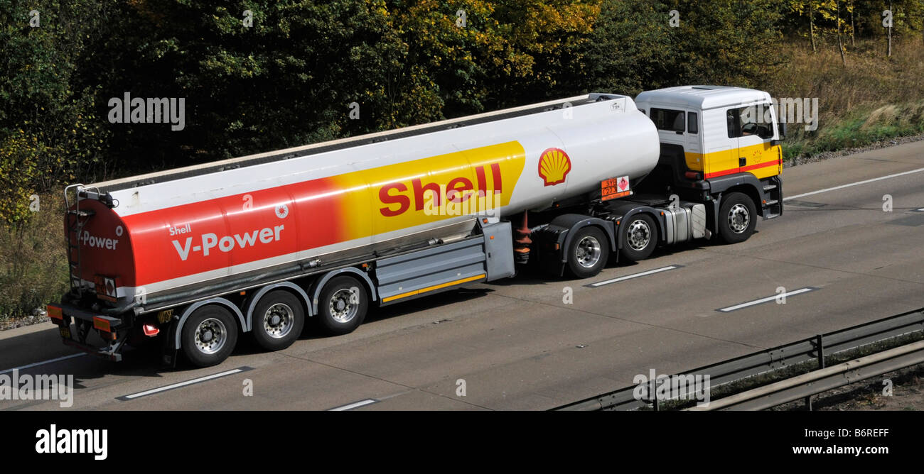 M25 motorway Shell articulated fuel tanker lorry and trailer on incline