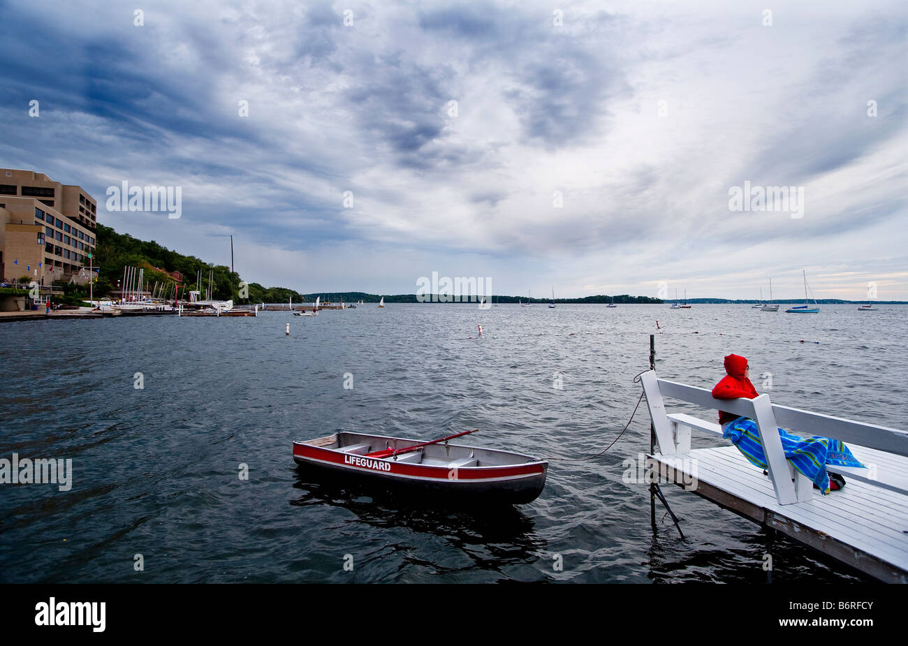 A life guard on duty at a swimming pier on Lake Mendota near the
