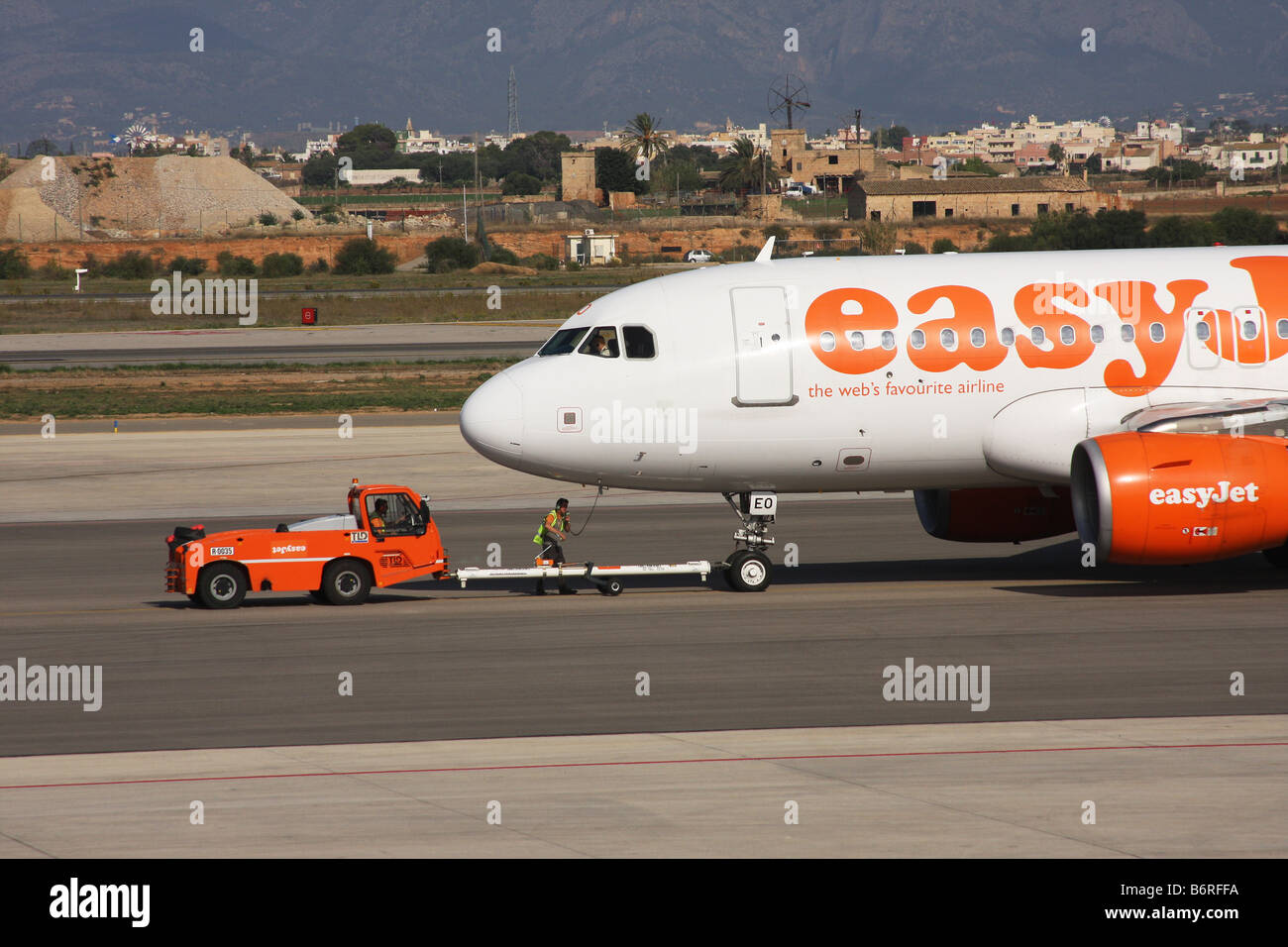 Aircraft being pushed out onto the runway ready for take off at Palma airport. Stock Photo