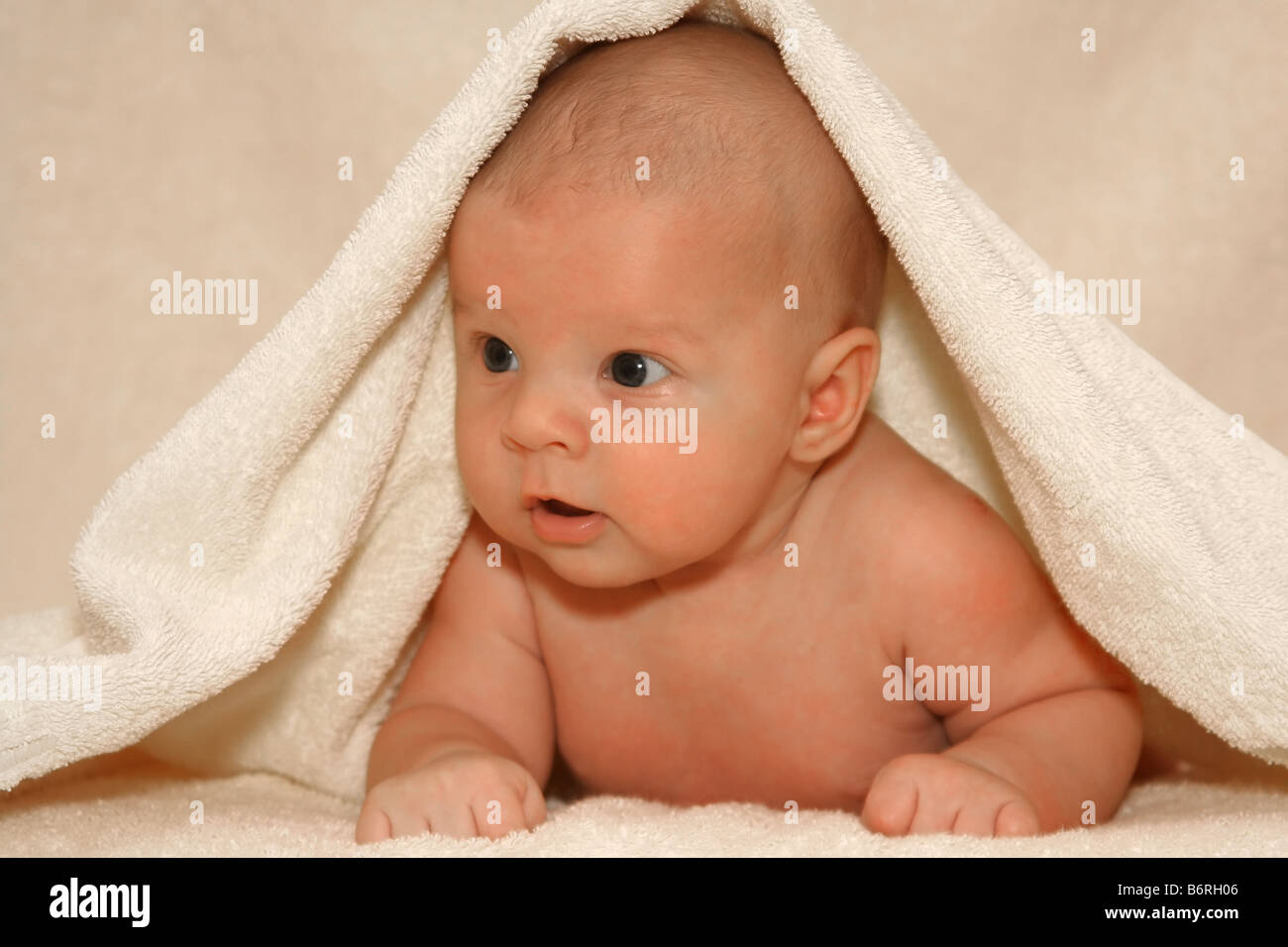 newborn baby under towel Stock Photo Alamy