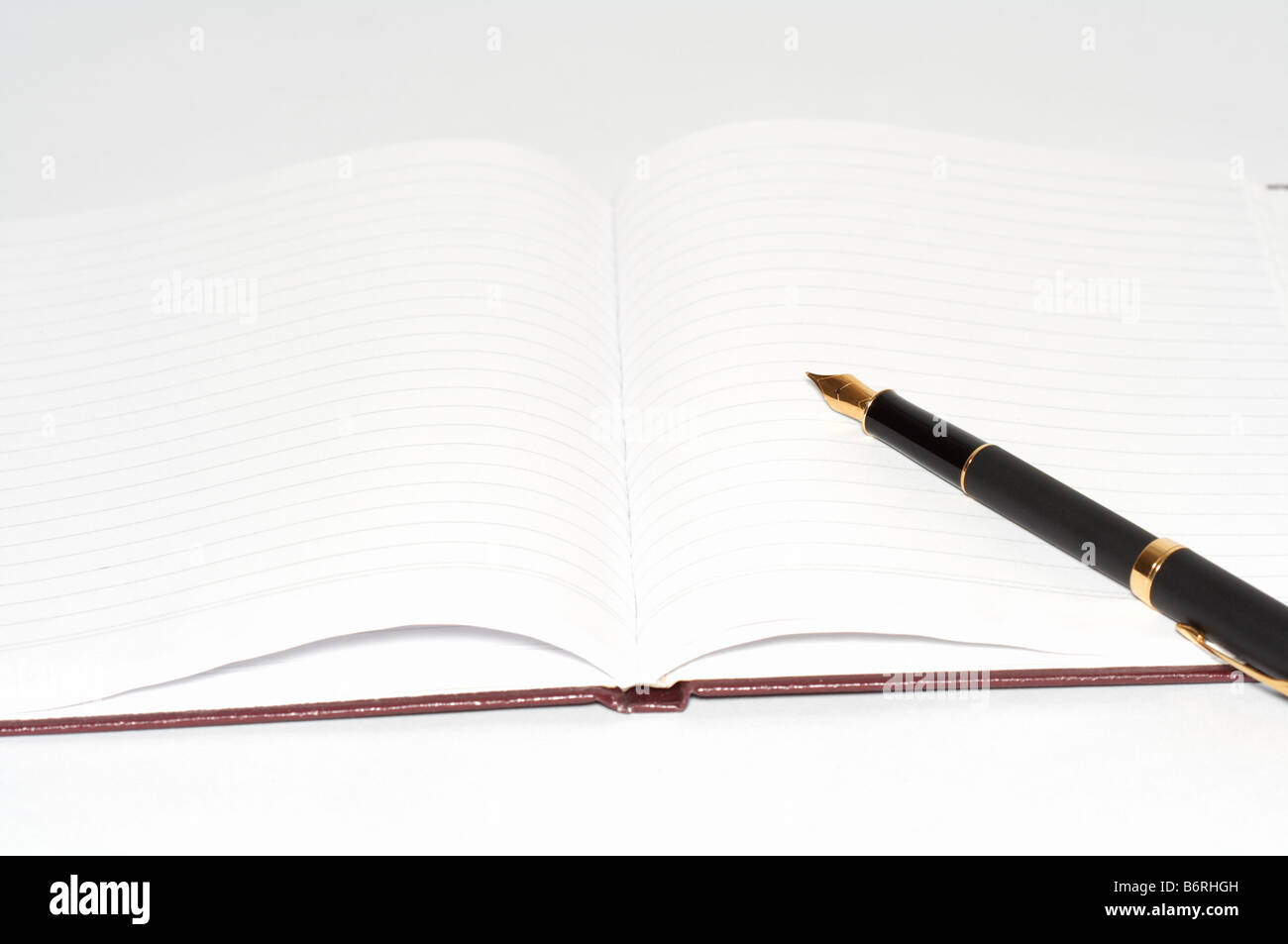fountain pen on the notepad Stock Photo Alamy