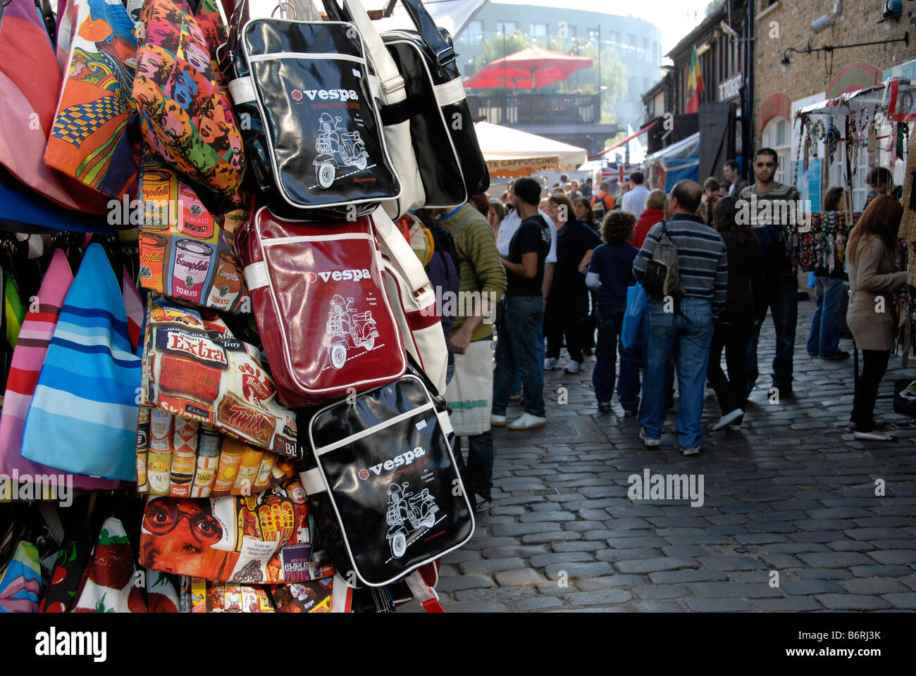 Vespa bags on sale at a stall in Camden Market London UK Stock Photo