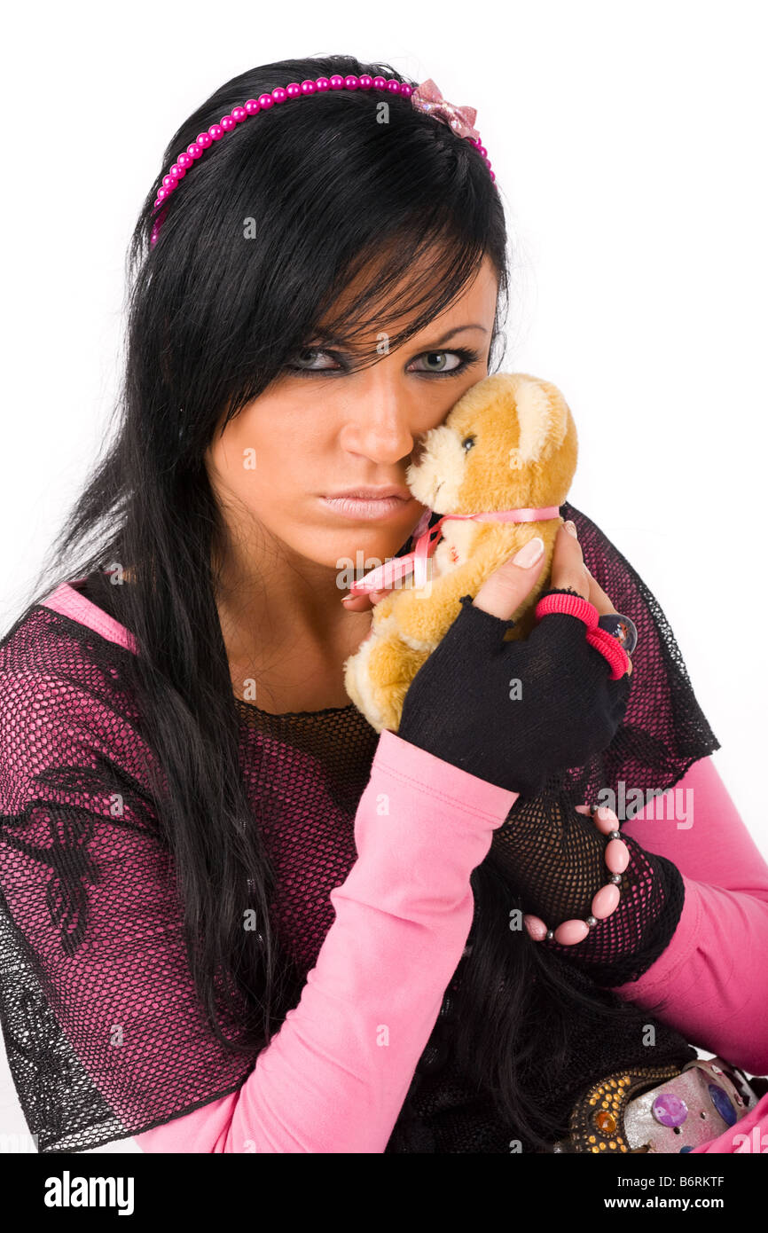 EMO girl posing with toy bear Stock Photo