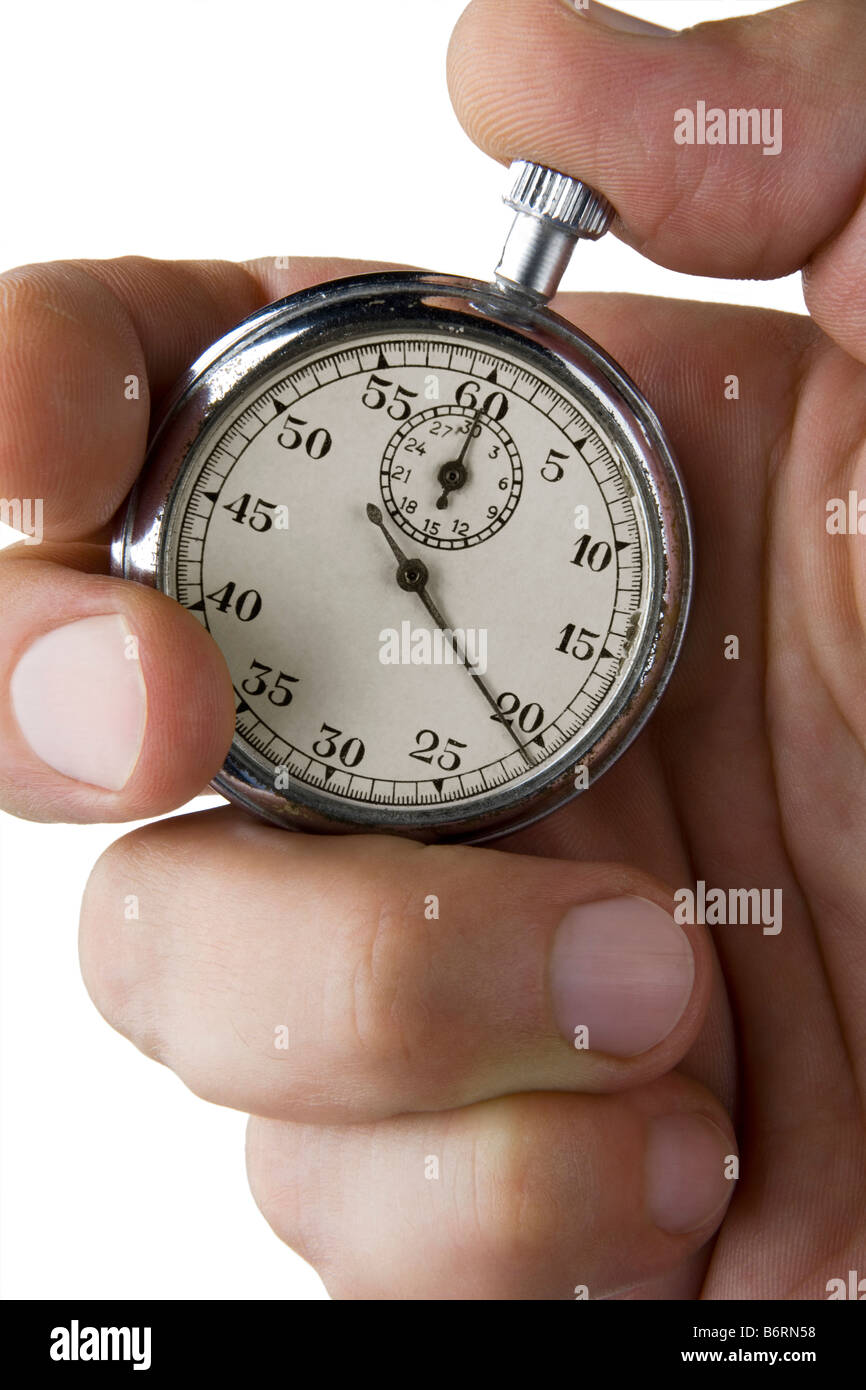hand holding a stopwatch against white background Stock Photo