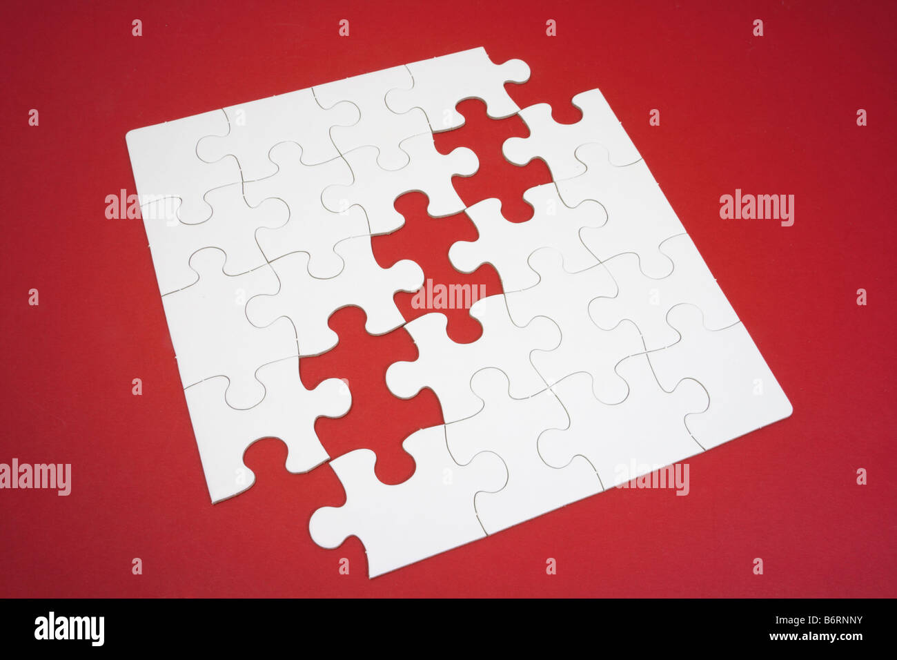 Jigsaw Puzzle with Missing Pieces Stock Photo