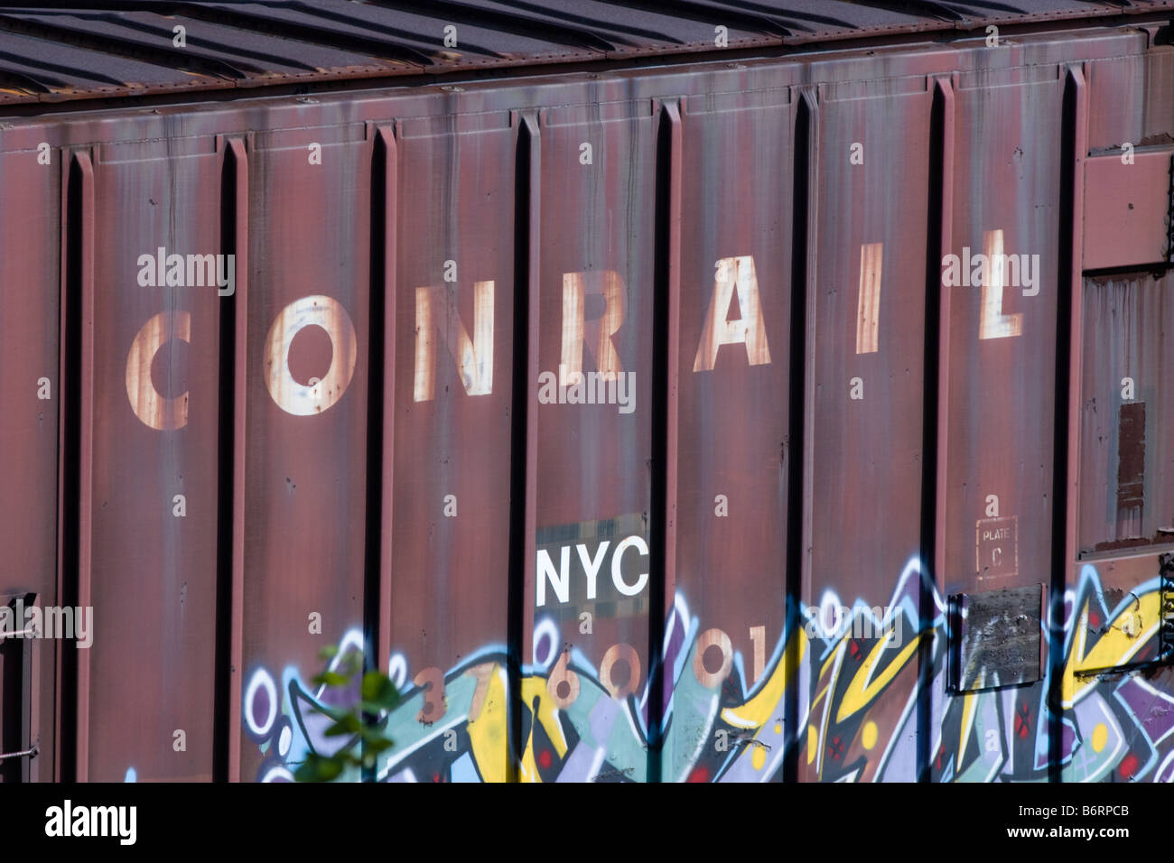 Conrail railroad boxcars coupled together in freight train in Rigby